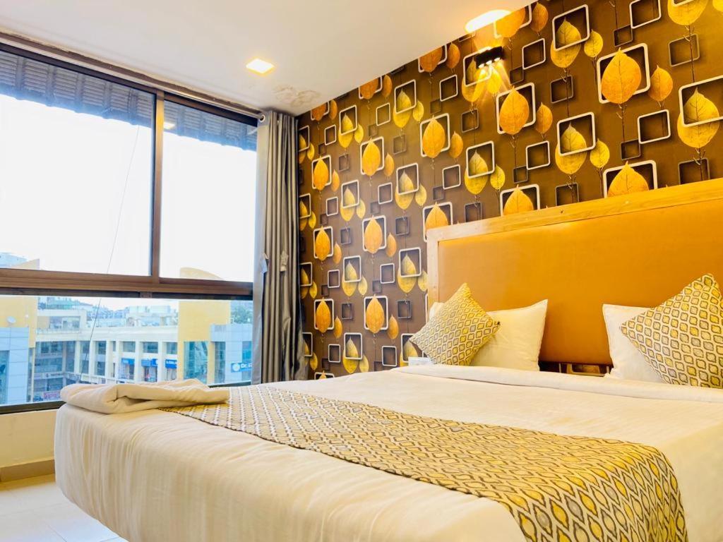 Hotel Alexa By Abc Ahmadábád Kültér fotó